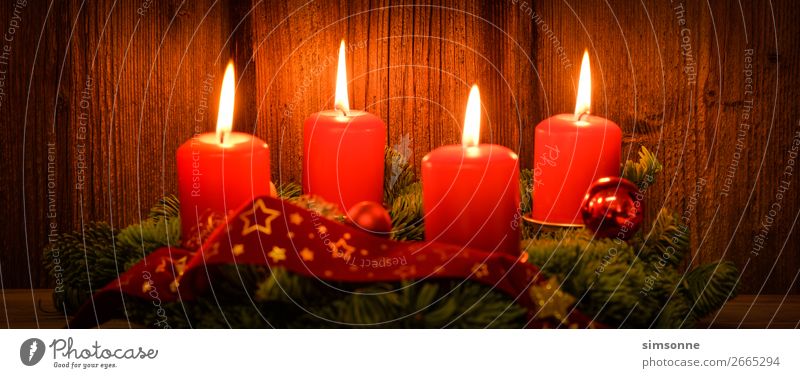 Christmas Advent wreath with 4 burning candles on old wood Decoration Christmas & Advent Candle Wood Flag Long Soft Red Moody Romance Christmas wreath