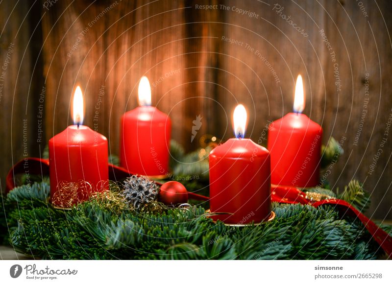 Christmas Advent wreath with 4 burning candles on old wood Decoration Christmas & Advent Candle Wood Flag Soft Red Moody Romance Christmas wreath Candlelight