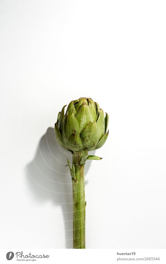 Fresh raw artichokes. On white background. Food Vegetable Nutrition Vegetarian diet Diet Healthy Eating Natural Above Green White Artichoke Raw Detox healthy