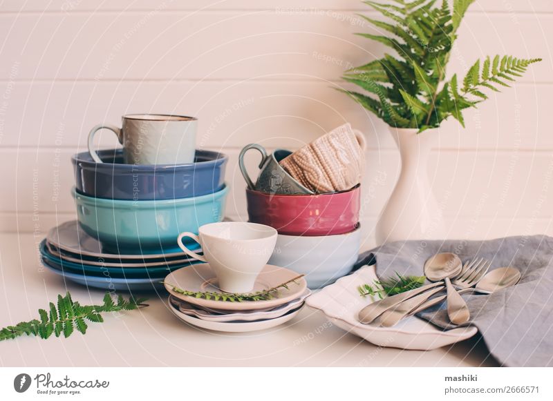 https://www.photocase.com/photos/2666571-natural-crockery-tableware-on-wooden-background-dot-photocase-stock-photo-large.jpeg