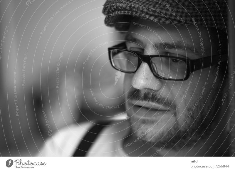 portrait Human being Masculine Young man Youth (Young adults) Head Face 1 18 - 30 years Adults Eyeglasses Cap Black-haired Facial hair Moustache Moody