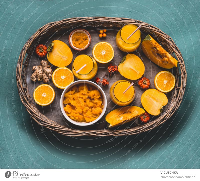 Healthy pumpkin smoothie on tray with ingredients Food Vegetable Fruit Herbs and spices Nutrition Organic produce Vegetarian diet Diet Beverage Juice Mug Glass