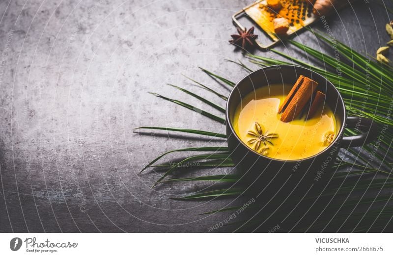Golden turmeric milk with spices and honey Food Herbs and spices Nutrition Organic produce Vegetarian diet Diet Beverage Hot drink Milk Cup Style Healthy