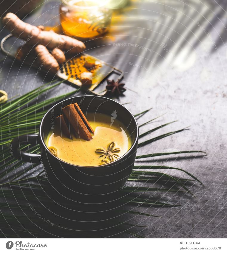 Cup of golden turmeric milk with spices Food Herbs and spices Nutrition Organic produce Diet Beverage Hot drink Milk Tea Style Design Healthy Health care