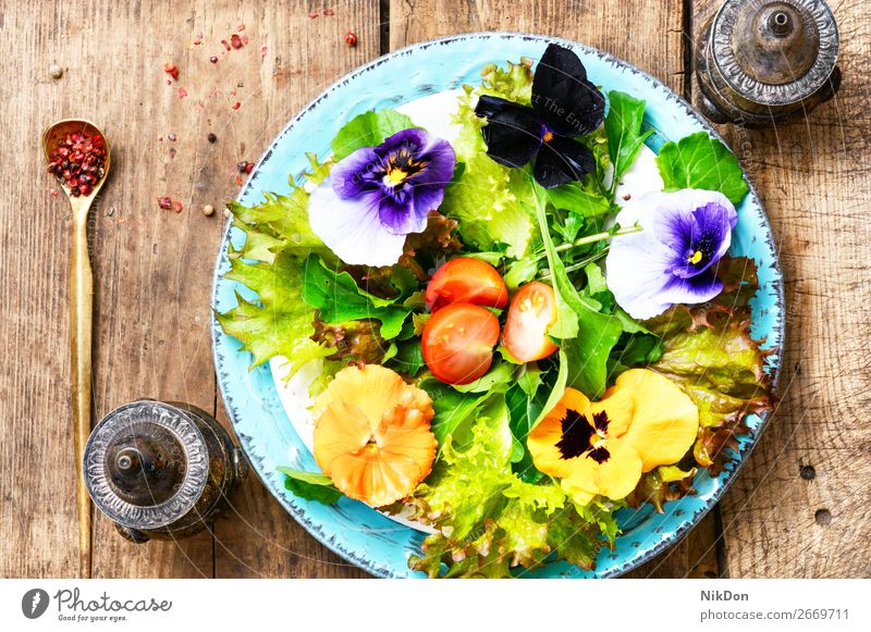 Spring flowers salad clean food fresh edible green healthy vegetarian spring vegetable diet dish herb herbal white organic plate mixed summer vitamin eatable