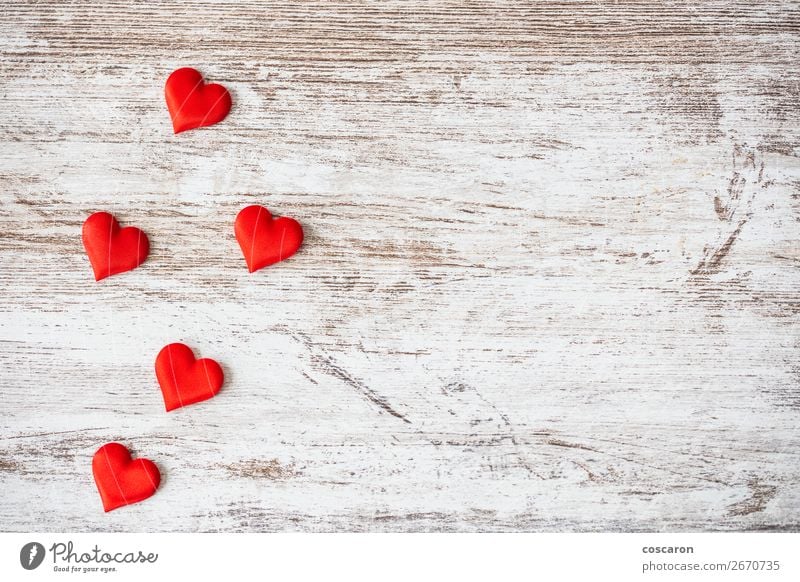 Many hearts on a wooden background. Valentines day concept. - a Royalty ...