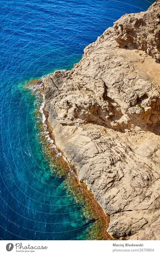 Aerial view of a rocky coastline, Mallorca. Vacation & Travel Adventure Far-off places Summer Ocean Waves Nature Landscape Rock Coast Blue water background