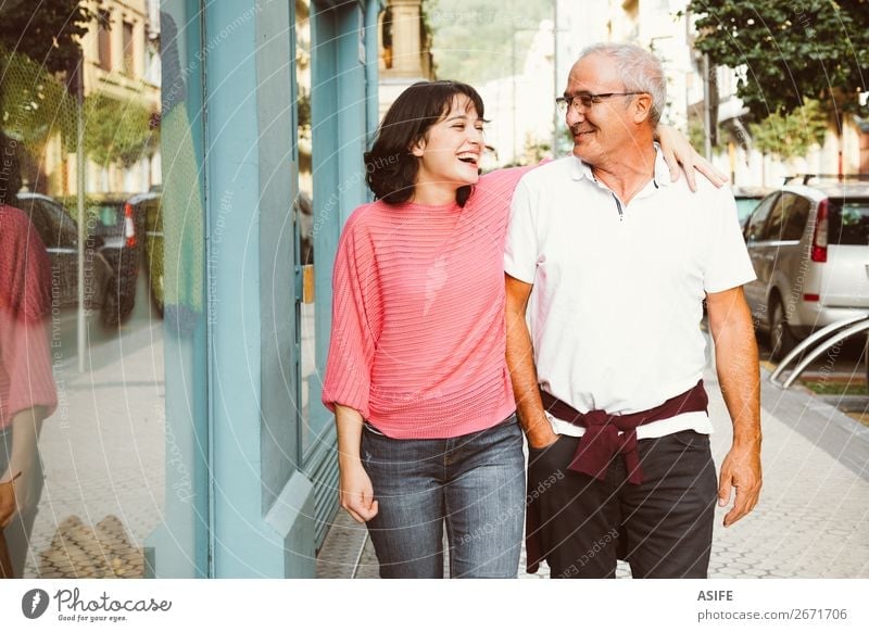 Complicity between father and daughter Joy Happy Beautiful Woman Adults Man Parents Father Family & Relations Street Eyeglasses Smiling Laughter Love Happiness