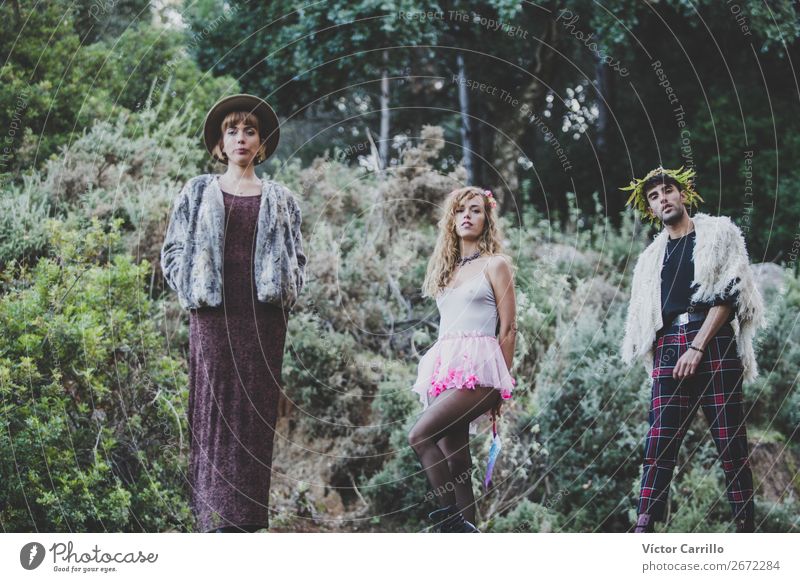 A Young group of friends Standing in the Woods Lifestyle Elegant Style Design Exotic Joy Human being Feminine Young woman Youth (Young adults) Young man Woman