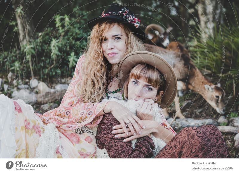 A Young Couple of Women in the woods Lifestyle Shopping Elegant Style Design Exotic Joy Human being Feminine Family & Relations Friendship Partner 2