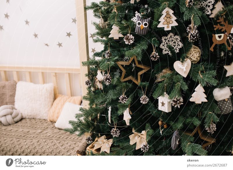 Christmas tree with decorations in the children's room Lifestyle Style Feasts & Celebrations Christmas & Advent New Year's Eve Education Art Fragrance Catch