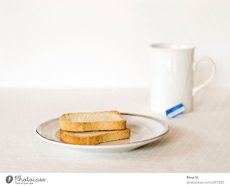 Light food II Dough Baked goods zwieback Nutrition Diet Tea Plate Mug Bright White Gluttony Teabag Subdued colour Interior shot Deserted Copy Space top High-key