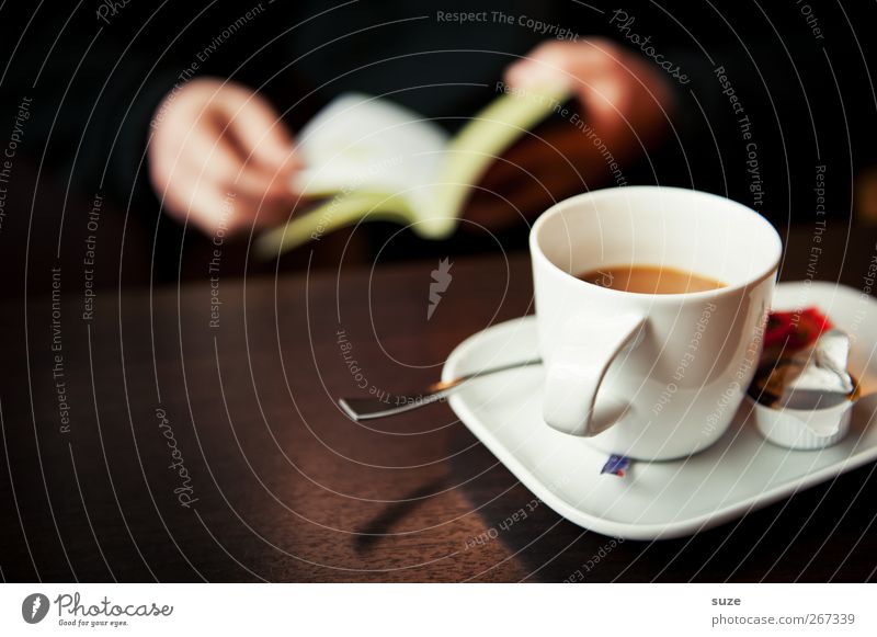cup of coffee Food Beverage Coffee Cup Spoon Harmonious Well-being Relaxation Calm Leisure and hobbies Reading Table Hand Book Dark Brown Break Know Time Café