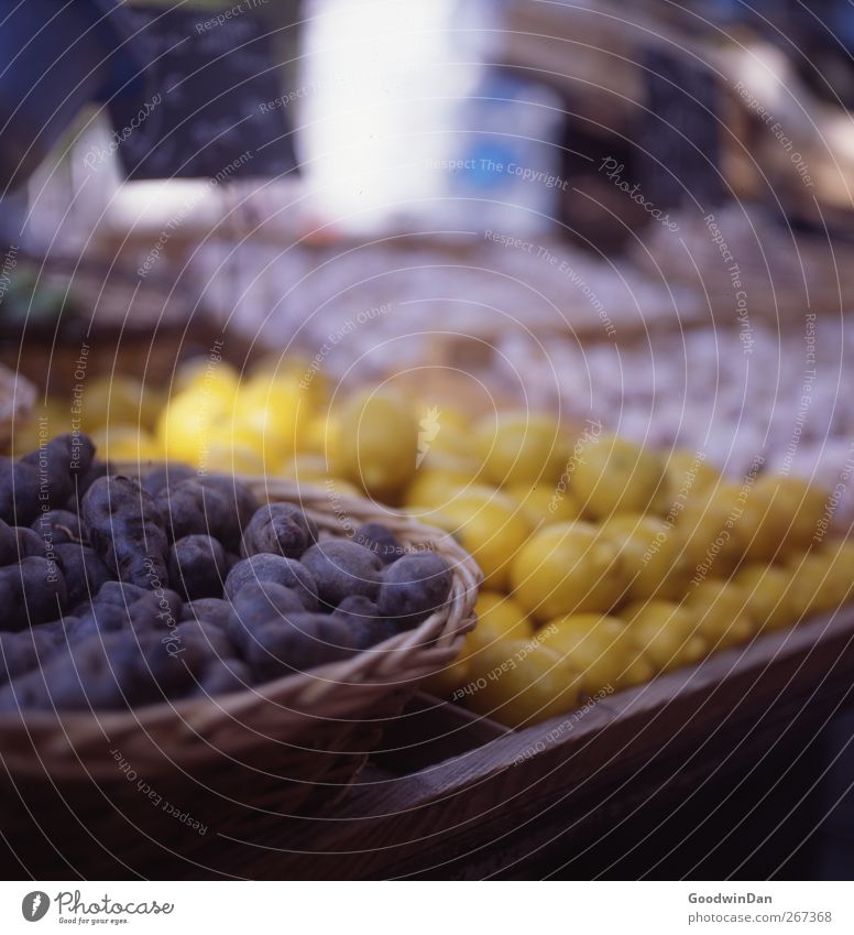 French tastes. Food Potatoes Lemon Nutrition Market stall Fresh Cheap Good Delicious Many Colour photo Exterior shot Deserted Day Light Shallow depth of field