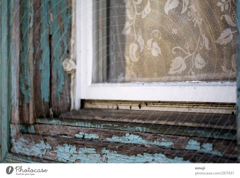 flake Wall (barrier) Wall (building) Facade Window Window pane Window board Window frame Curtain Old Turquoise Varnished Flake off Romanesque style Colour photo