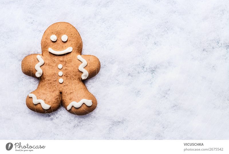 Gingerbread man on snow Food Dough Baked goods Chocolate Nutrition Banquet Shopping Style Design Winter Snow Party Event Feasts & Celebrations