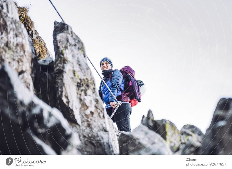 Young woman on via ferrata Leisure and hobbies Vacation & Travel Expedition Hiking Climbing Mountaineering Youth (Young adults) 18 - 30 years Adults Nature