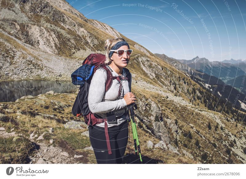 Young woman crossing the Alps | E5 long-distance hiking trail Vacation & Travel Adventure Expedition Mountain Hiking Climbing Mountaineering