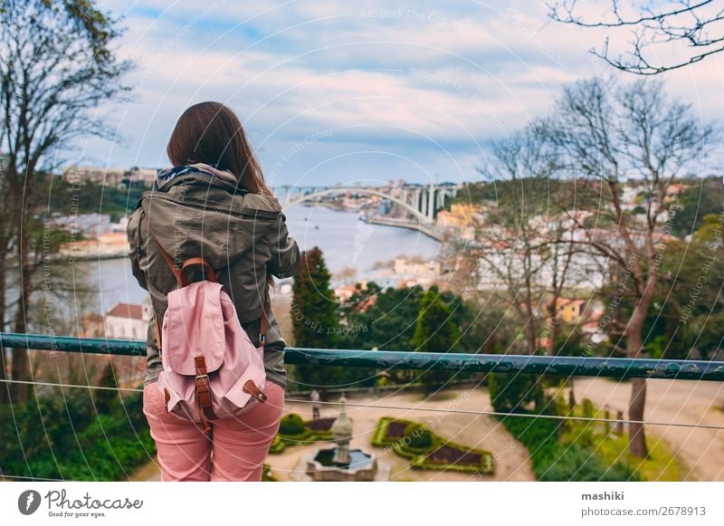 Tourist woman visiting Porto, Portugal. Lifestyle Vacation & Travel Tourism Adventure Sightseeing Woman Adults Culture Landscape River Town Bridge Building