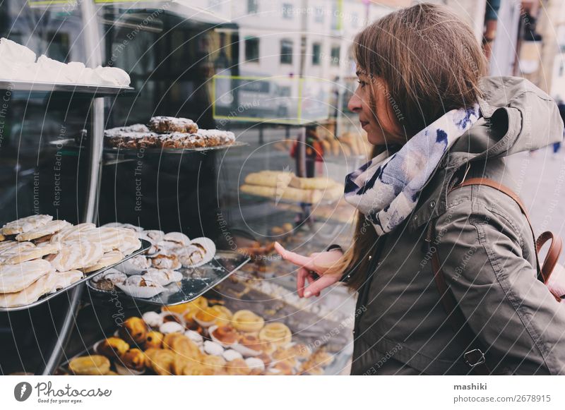 woman choosing sweet cakes at street cafe Cake Dessert Coffee Lifestyle Shopping Happy Leisure and hobbies Restaurant Woman Adults Smiling Delicious Café