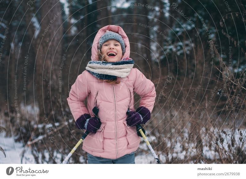 happy child girl skiing in winter snowy forest Joy Leisure and hobbies Vacation & Travel Adventure Winter Snow Sports Child Youth (Young adults) Landscape