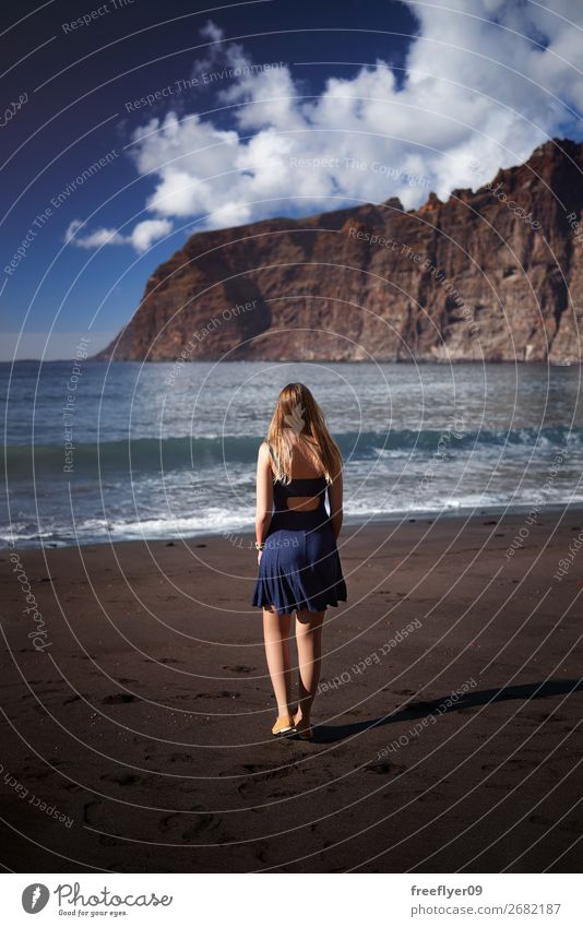 Young girl on Los Gigantes Beach, in Tenerife Vacation & Travel Tourism Trip Far-off places Freedom Sightseeing Summer Mountain Hiking Feminine Young woman