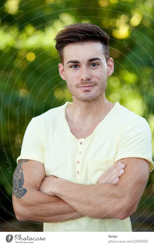 Attractive guy in the park Lifestyle Joy Happy Face Summer Human being Masculine Boy (child) Man Adults Arm Nature Park Fashion Piercing Modern Muscular Cute