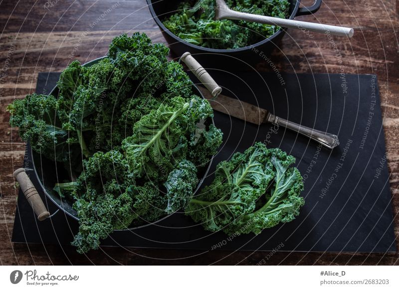 Prepare kale for cooking top view Food Vegetable Lettuce Salad Kale Kale leaf Cabbage Organic produce Vegetarian diet Diet Fasting Bowl Pot Knives Spoon