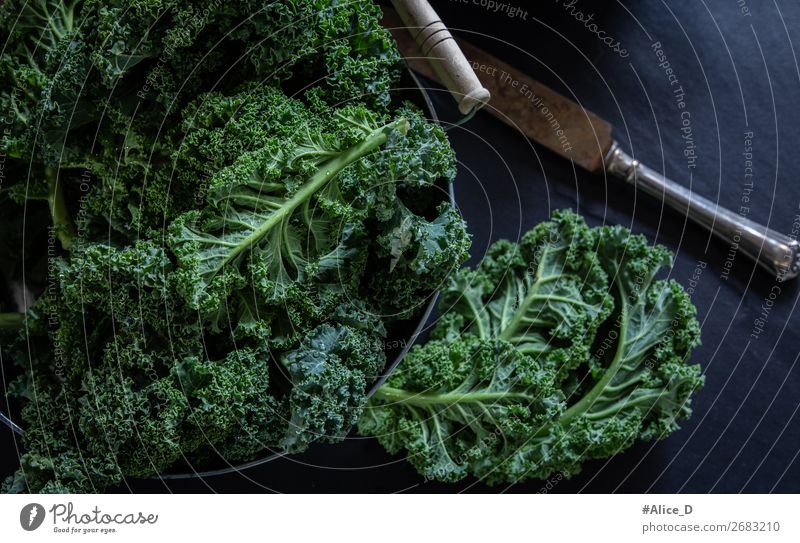 Fresh kale on black background Food Vegetable Lettuce Salad Kale Kale leaf Cabbage Nutrition Organic produce Vegetarian diet Diet Fasting Bowl Knives Lifestyle