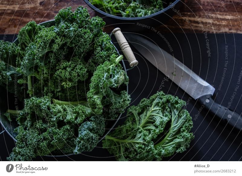 Fresh kale on cutting board Food Vegetable Lettuce Salad Cabbage Kale Kale leaf Nutrition Organic produce Vegetarian diet Diet Bowl Knives Lifestyle Healthy