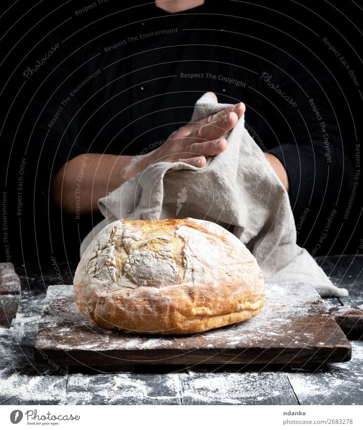 baked round bread Bread Nutrition Table Kitchen Cook Hand Fingers Wood Eating Make Dark Fresh Brown Black White Tradition Baking Bakery board cooking