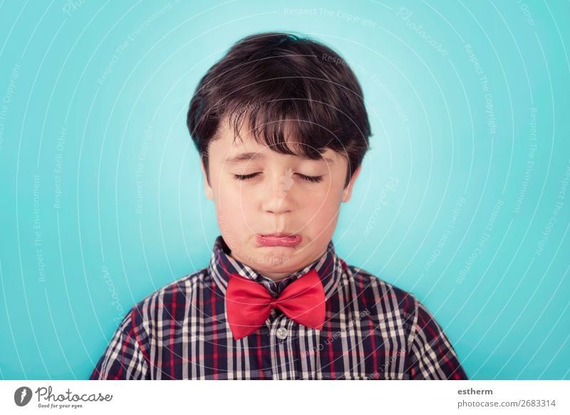 sad boy with bow tie Human being Masculine Child Toddler Infancy 1 8 - 13 years Think Fitness Sadness Cry Anger Emotions Concern Grief Loneliness Stress