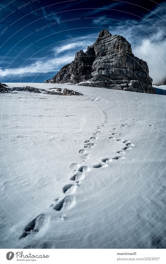 Footprints for dirndling from the Dachstein group Snow Winter vacation Mountain Hiking Climbing Mountaineering Nature Landscape Beautiful weather Rock Alps Peak