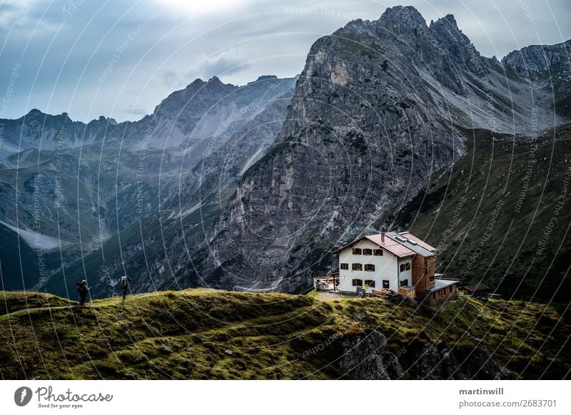 Hikers reach the Steinseehütte Vacation & Travel Trip Adventure Mountain Hiking Climbing Mountaineering 2 Human being Nature Landscape Clouds Rock Alps Peak