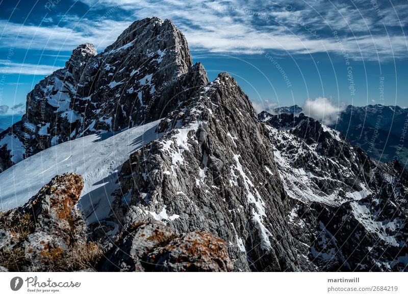 Mountain ridge for dirndling in the Dachstein group Hiking Beautiful weather Rock Alps Peak Wall of rock Vantage point Clouds Peak cross Colour photo