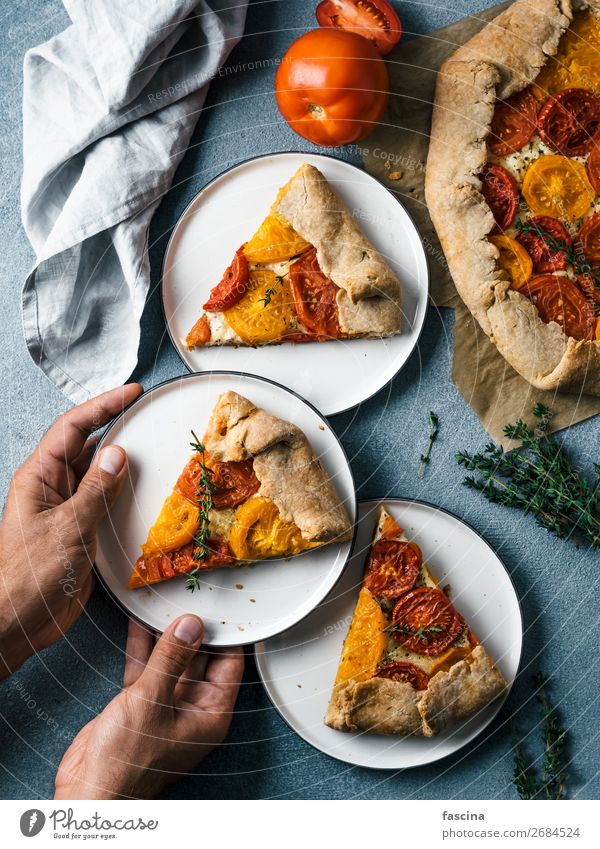 tomatoes and cheese tart or galette Cheese Vegetable Eating Breakfast Lunch Kitchen Hand Delicious Idea Tomato ready-to-eat Pie cake tarte recipes piece healthy