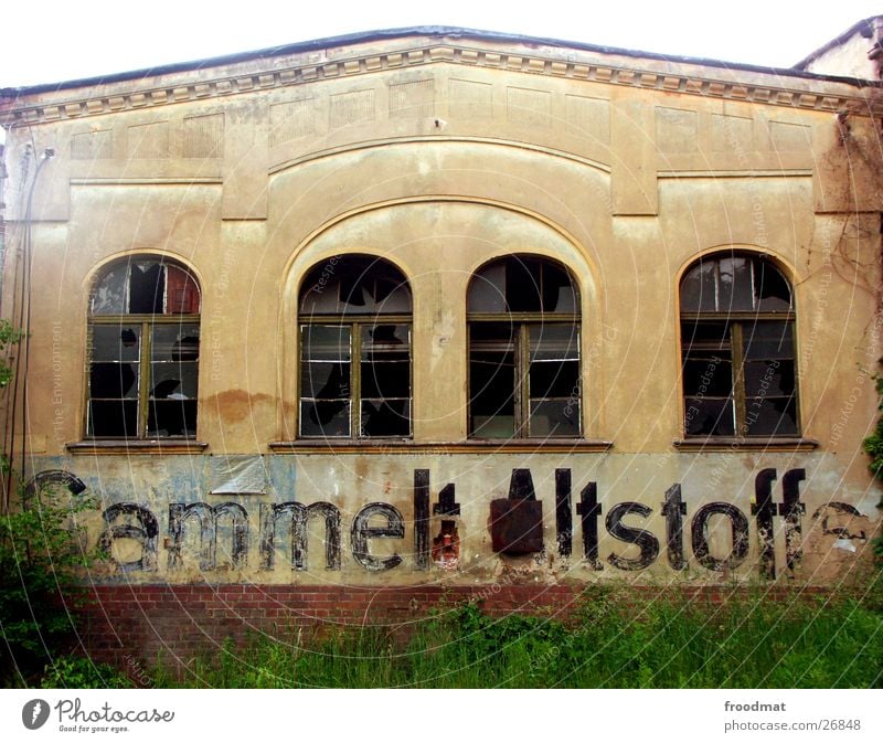 Collects waste materials ! East Derelict Arch Typography Window Broken Historic Characters GDR Old
