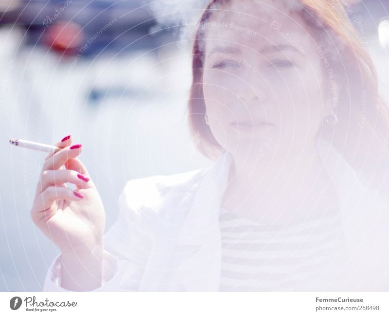 Taking a cigarette break I. Young woman Youth (Young adults) Woman Adults Head Hand Fingers 1 Human being 18 - 30 years Relaxation Cigarette Cigarette smoke