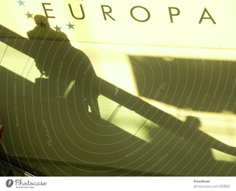 Europe Escalator Wall (building) Businesspeople Hannover Direction Diagonal Meaning Human being Silhouette Typography Politics and state Window Shadow
