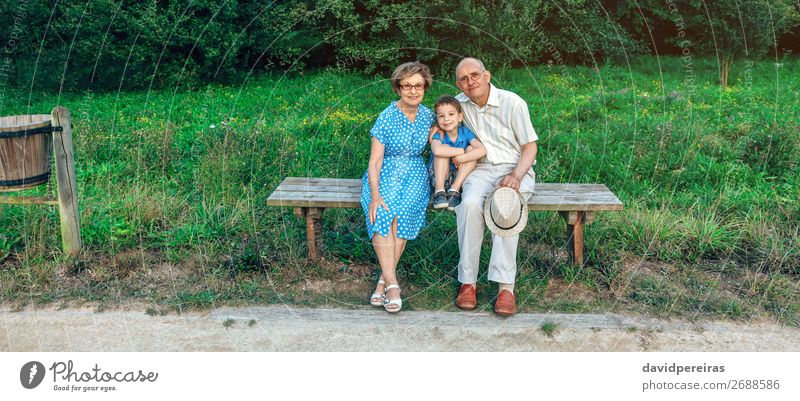 Grandparents and grandson posing for a photo Lifestyle Happy Leisure and hobbies Child Technology Human being Boy (child) Woman Adults Man Grandfather