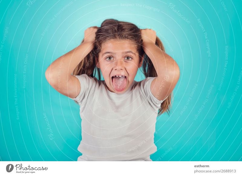 portrait of angry girl on blue background Lifestyle Human being Feminine Girl Infancy 1 8 - 13 years Child To talk Fitness Scream Sadness Aggression Rebellious