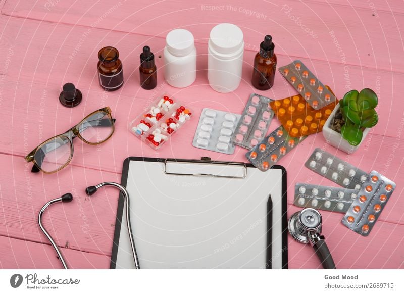 blank clipboard, medicine bottles, stethoscope, pills Bottle Health care Illness Medication Science & Research Doctor Workplace Eyeglasses Paper Wood Heart Pink