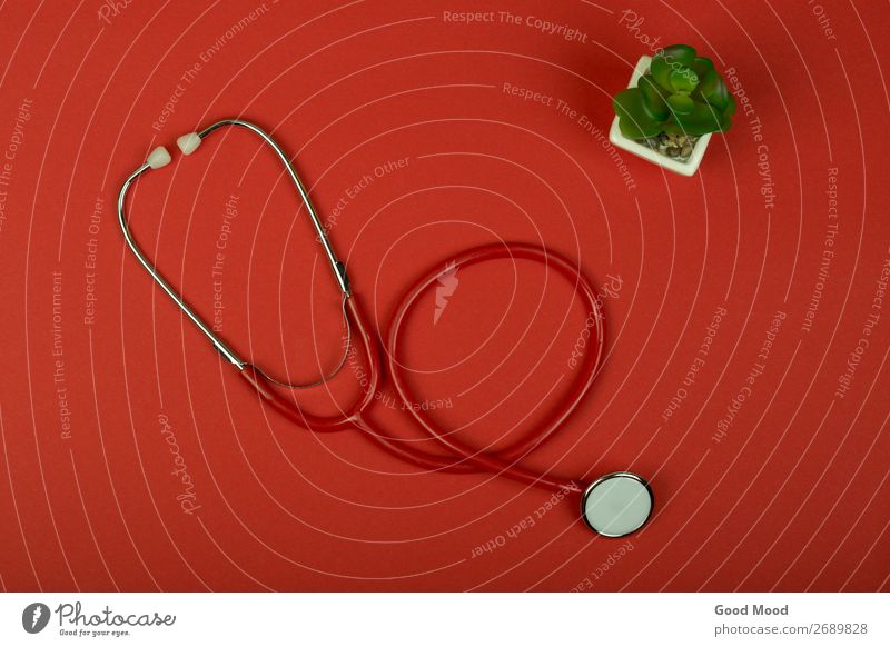 top view red stethoscope on red paper background Health care Medical treatment Illness Medication Wellness Table Science & Research Examinations and Tests