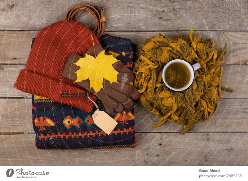 cup of tea, maple leaves, key with blank label, warm clothes Tea Lifestyle Shopping Relaxation Leisure and hobbies Vacation & Travel Trip Winter Table