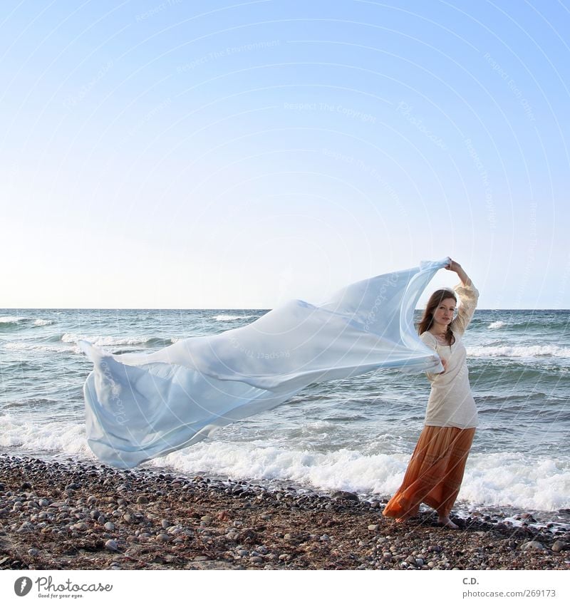 On the beach Young woman Youth (Young adults) 1 Human being 18 - 30 years Adults Water Sky Cloudless sky Waves Beach Baltic Sea Skirt Long-haired Esthetic Free