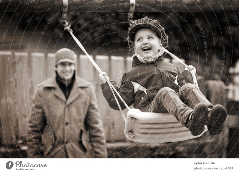 happy childhood, child on the swing Joy Leisure and hobbies Playing Human being Masculine Feminine Child Girl Young man Youth (Young adults) Father Adults