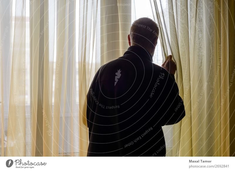 Man Looking out of the Window Human being Adults Observe Think Stand Wait backlight backlit Caucasian Curtain Home interior move observing Ready room