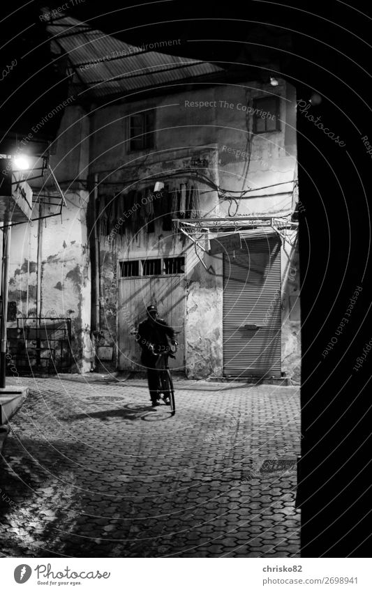 Cyclists in Marrakech Cycling Man Adults 1 Human being Marrakesh Morocco Town Old town Means of transport Street Bicycle Movement Driving Dark Serene Calm