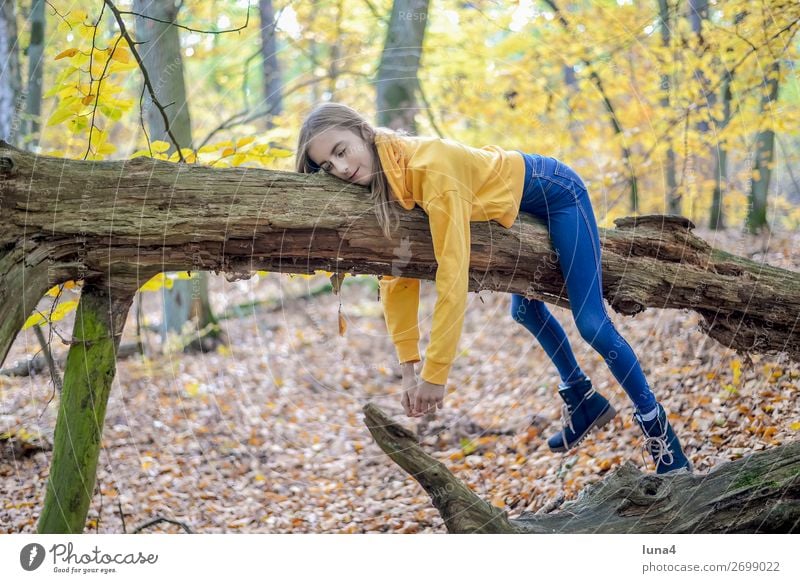 teenager lies on tree Lifestyle Joy Happy Contentment Relaxation Calm Leisure and hobbies Trip Child Girl Nature Tree Forest Dream Sadness Hope Boredom Longing