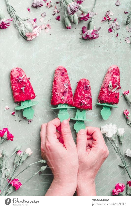 Hands with homemade ice cream on a stick Food Fruit Dessert Nutrition Style Design Healthy Healthy Eating Summer Feminine Pink Lollipop Snack ice on a stick